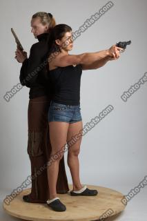 2021 01 OXANA AND XENIA STANDING POSE WITH GUNS 4 (7)